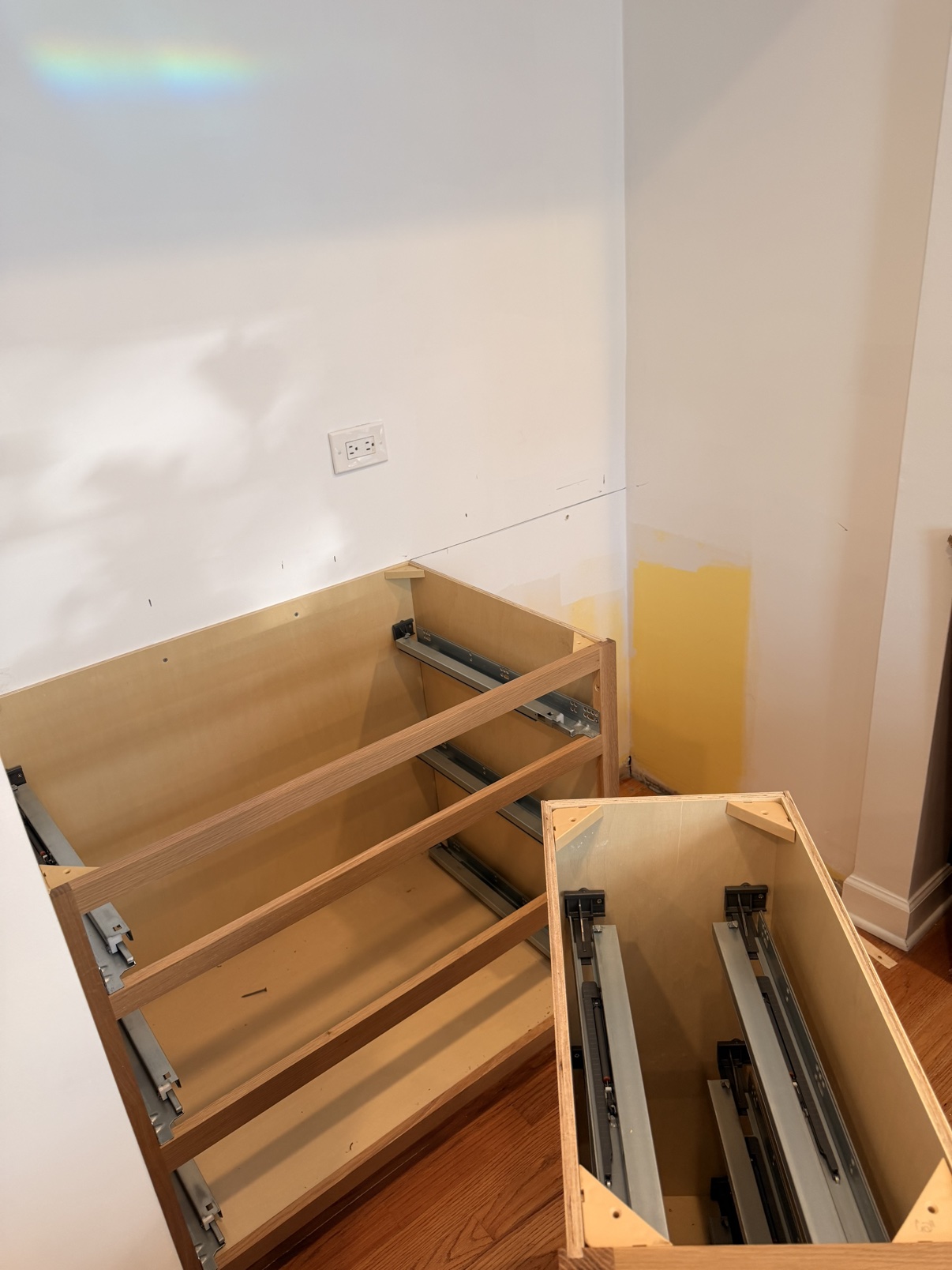Before: cabinet boxes being fitted and aligned