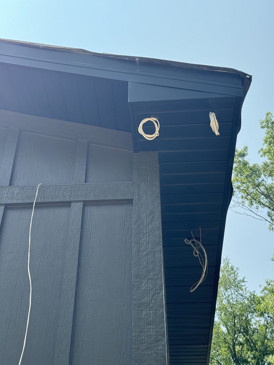 Camera cable pre-wiring at exterior soffit
