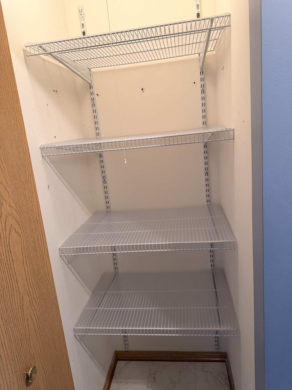 After: new wire closet shelving installed