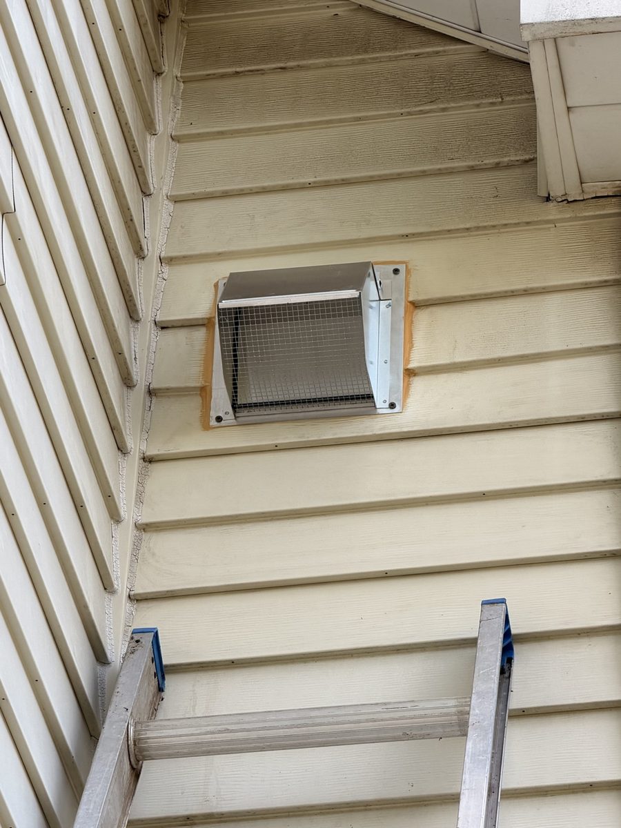 Dryer vent newly installed on house siding